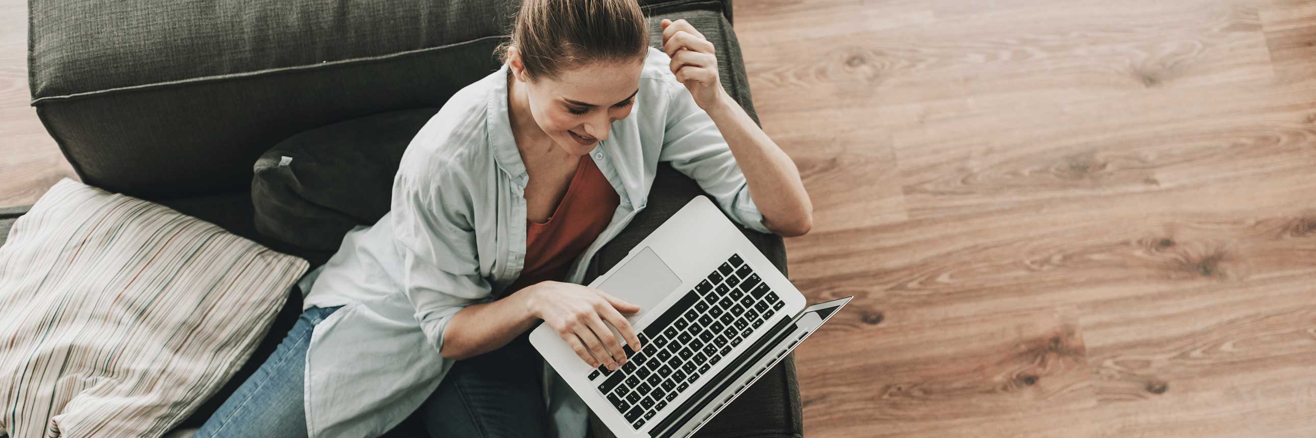 woman with computer seen top down